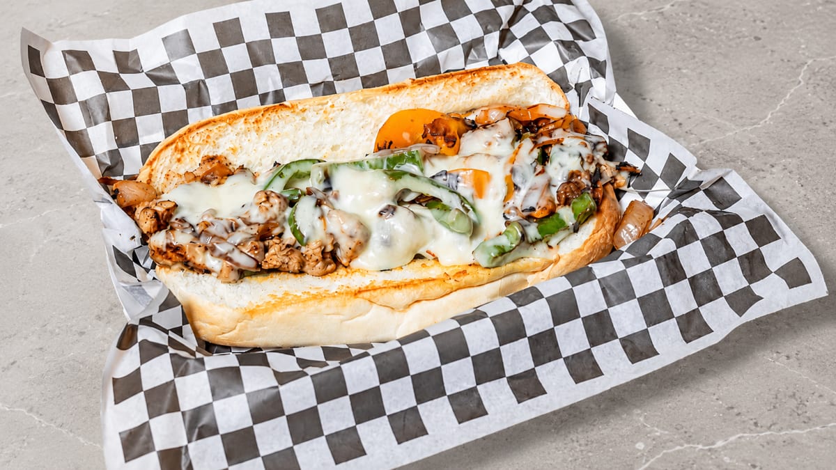 Thin-sliced steak, melted cheese, grilled onions, and serious flavor.