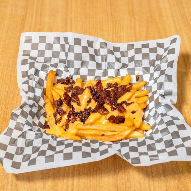 Crispy fries, melted cheese, sauces, toppings, and big late-night flavor.